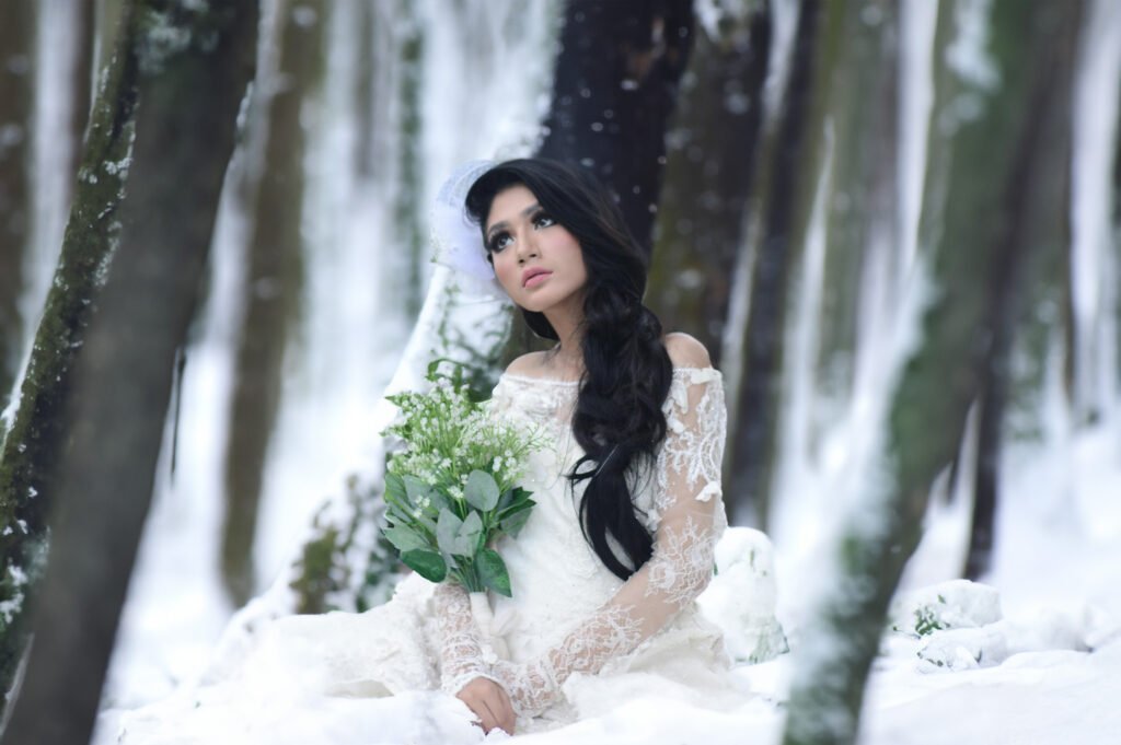 Women in wedding dress with winter AI generated forest with snow in the background