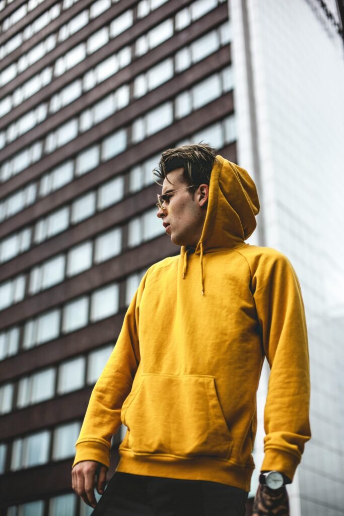 Man in yellow sweatshirt